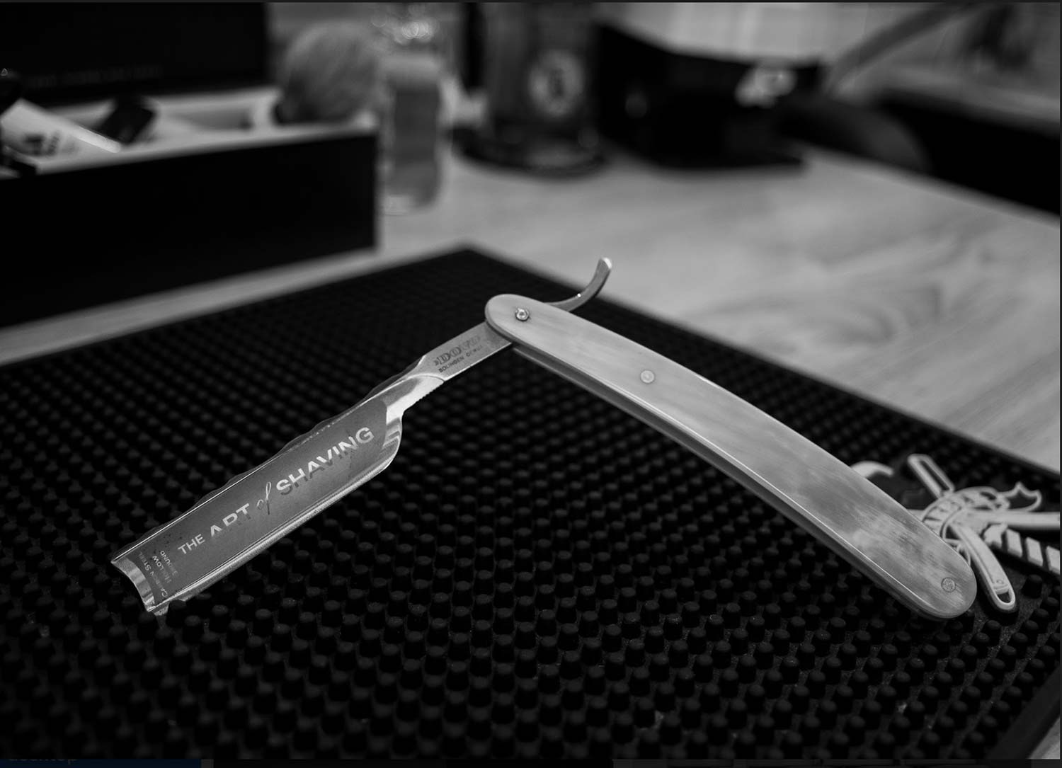 Straight razor on a barber station.